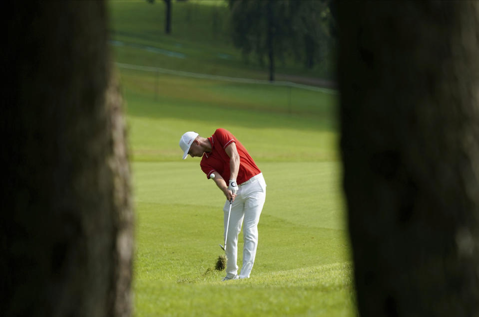 Austria's Sepp Straka plays a shot from the second fairway during the first round of the men's golf event at the 2020 Summer Olympics on Wednesday, July 28, 2021, at the Kasumigaseki Country Club in Kawagoe, Japan. (AP Photo/Matt York)