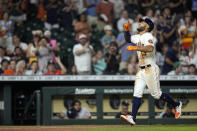 Houston Astros' Abraham Toro (13) celebrates after hitting a two-run home run against the Chicago White Sox during the seventh inning of a baseball game Thursday, June 17, 2021, in Houston. (AP Photo/David J. Phillip)