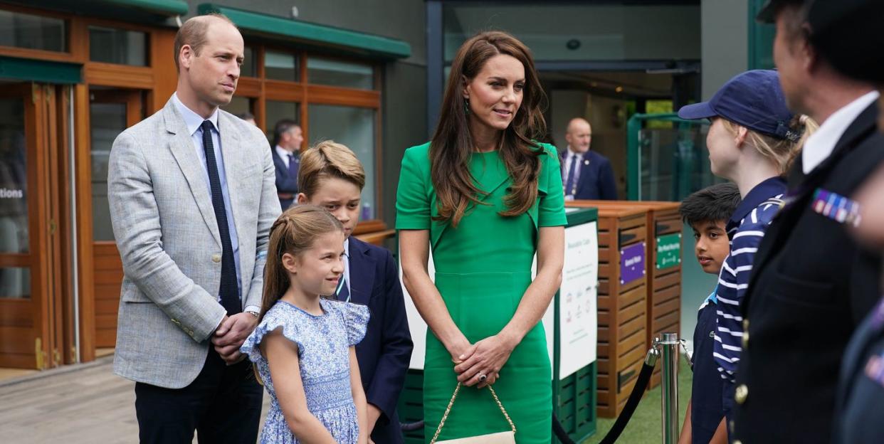 london, england july 16 l r prince william, prince of wales, princess charlotte, prince george and catherine, princess of wales, speak to ball boys and girls as they arrive to attend day fourteen of the wimbledon tennis championships at all england lawn tennis and croquet club on july 16, 2023 in london, england photo by victoria jones wpa poolgetty images