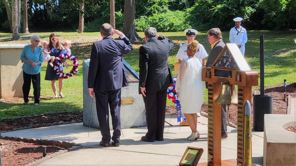 Family members of those on the USS Stark in the 1987 attack lay wreaths on the brass memorial inscribed with their names at the end of Tuesday's 35th memorial.