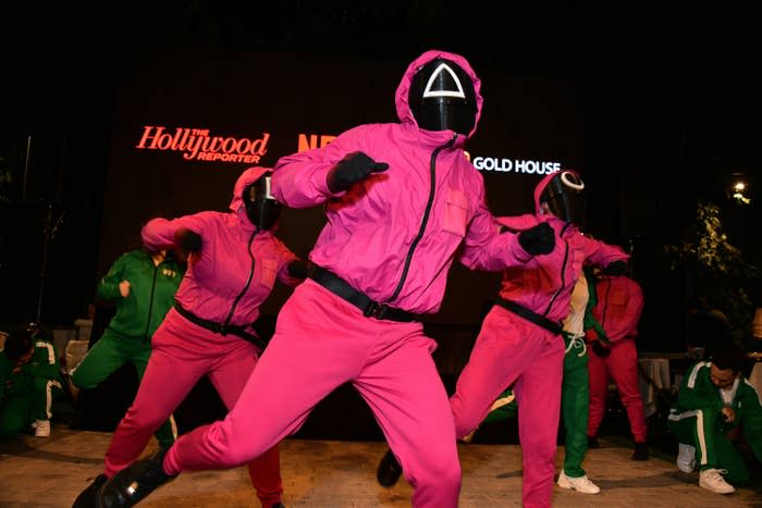GRV Dance Crew dressed as Squid Game characters performing at the Asian Pacific Islander Excellence Celebration