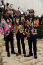 <p>We couldn’t pull together a guide to the best dressed men of the evening without including Migos. Decked in Versace, the rap trio donned their signature sunnies and somehow made their go-to aesthetic work with the theme. <em>[Photo: Getty]</em> </p>