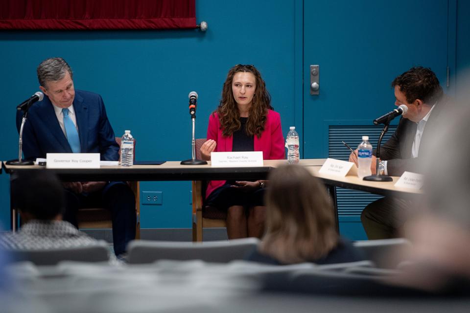 Rachael Ray, a teacher with Madison County Schools, speaks during a roundtable with Gov. Roy Cooper on the state of public education June 30, 2023.