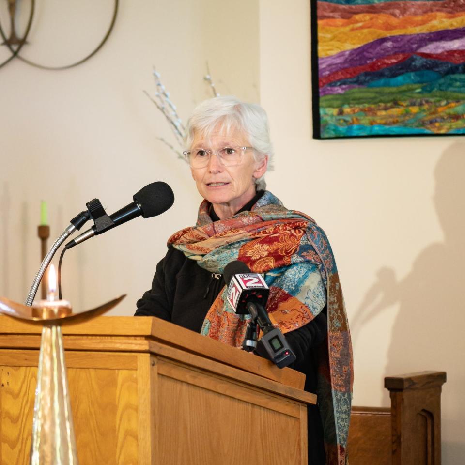 Rev. Karen Brammer speaks at Utica Unitarian Universalist Church on Thursday, May 25, 2023 to call for County Executive Anthony Picente Jr. to reverse his position stating that Oneida County will not accept asylum seekers as New York City overflows with people in acute need of safety. 