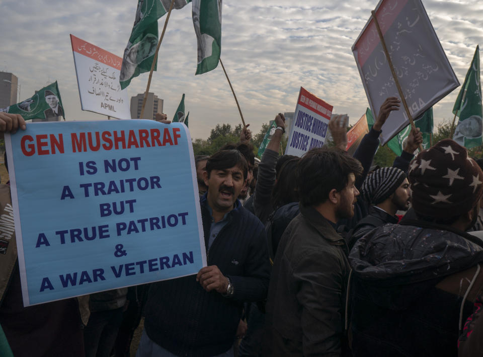 Supporters of former Pakistani military ruler Gen. Pervez Musharraf protest a court's decision, in Islamabad, Pakistan, Wednesday, Dec. 18, 2019. The Pakistani court sentenced Musharraf to death in a treason case related to the state of emergency he imposed in 2007 while in power, officials said. Musharraf who is apparently sick and receiving treatment in Dubai where he lives was not present in the courtroom. (AP Photo/B.K. Bangash)