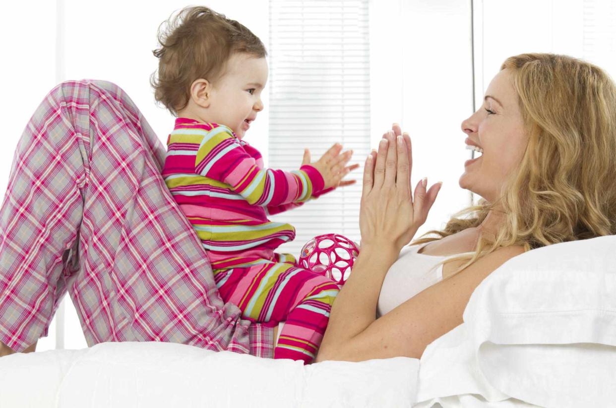 Mom and baby clapping