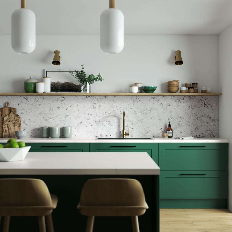 a kitchen with green cabinets