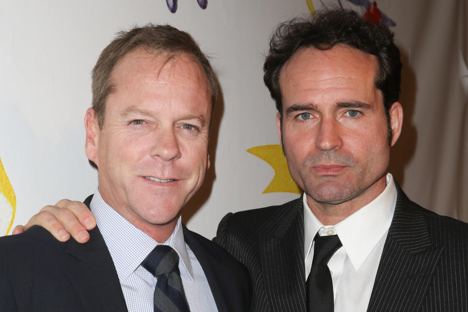 WEST HOLLYWOOD, CA - NOVEMBER 13:  Actors Kiefer Sutherland (L) and Jason Patric arrive at the 