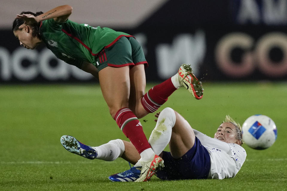 United States defender Abby Dahlkemper, right, and Mexico forward Kiana Palacios, left, vie for the ball during a CONCACAF Gold Cup women's soccer tournament match, Monday, Feb. 26, 2024, in Carson, Calif. (AP Photo/Ryan Sun)