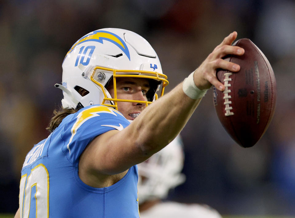 Gear up, NFL fans: Justin Herbert vs. Trevor Lawrence on Saturday should be a blast. (Photo by Harry How/Getty Images)