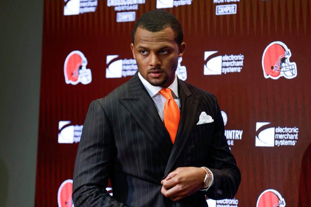 Cleveland Browns quarterback Deshaun Watson enters a news conference at the NFL football team’s training facility, on March 25, 2022, in Berea, Ohio. (AP Photo/Ron Schwane, File)