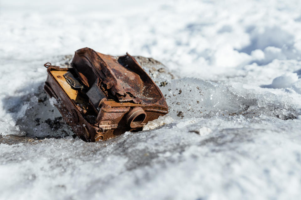 The team found a portion of Washburn's aerial camera, which is believed to be his first-ever aerial photography camera, according to a press release from Teton Gravity Research. They were also able to retrieve two other cameras with film still loaded inside.  / Credit: Teton Gravity Research/Leslie Hittmeier