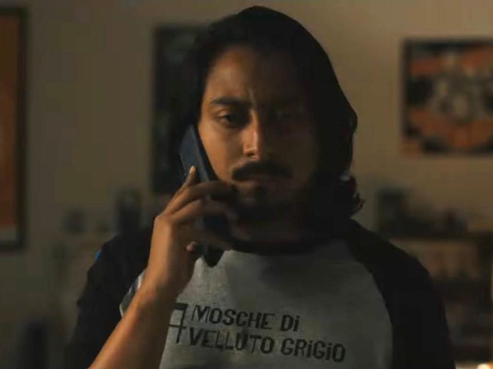 Tony Revolori as Gabe on the phone.