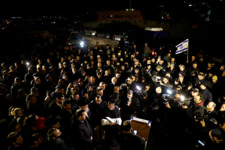 Israeli mourners attend the funeral of a baby who died after being delivered prematurely following a shooting attack near the Israeli settlement of Ofra, in the Israeli-occupied West Bank, at Mount of Olives cemetery in Jerusalem December 12, 2018. REUTERS/Ronen Zvulun