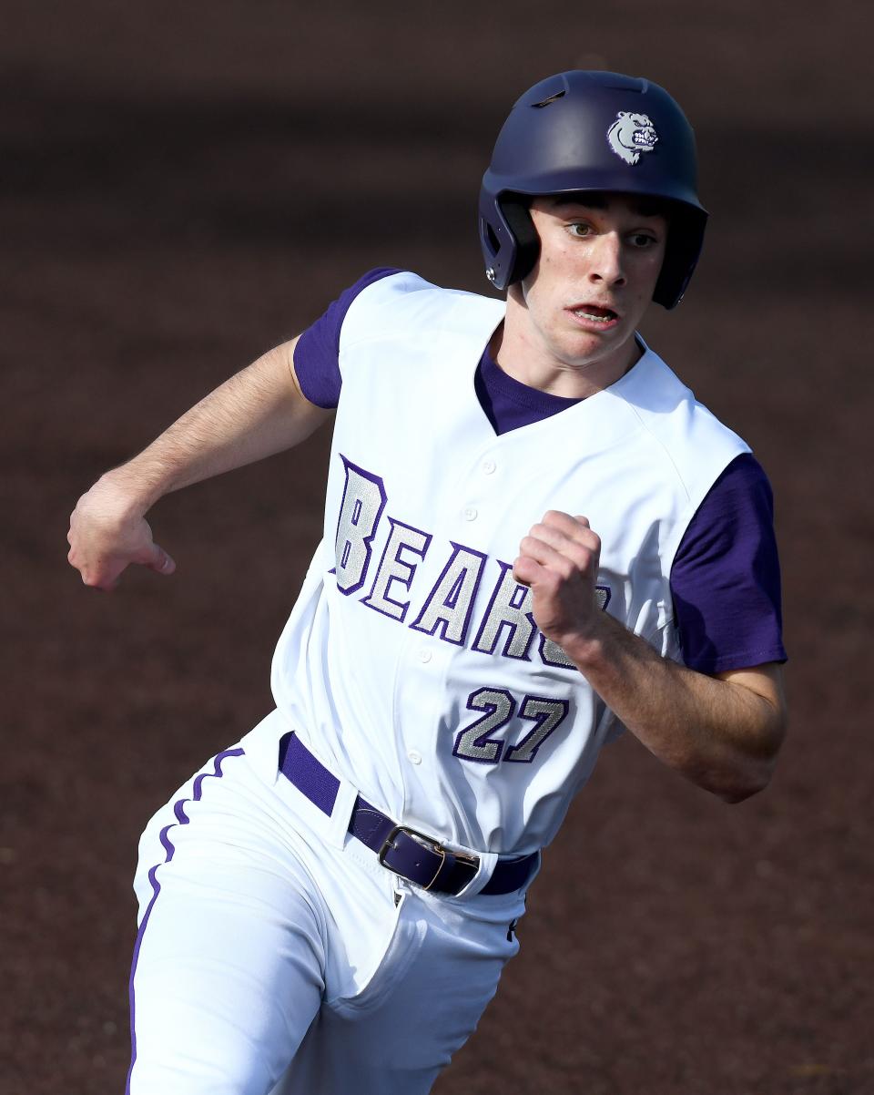 Garrett Wright of Jackson rounds third base on his way to score in the first inning against Hoover at Jackson Tuesday, April 6, 2021.
