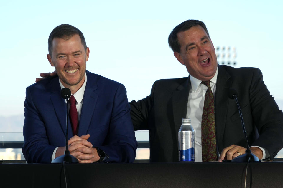 Nov 29, 2021; Los Angeles, CA, USA; Lincoln Riley (left) and Southern California Trojans athletic director Mike Bohn react during a press conference to introduce Riley as USC head coach. Mandatory Credit: Kirby Lee-USA TODAY Sports