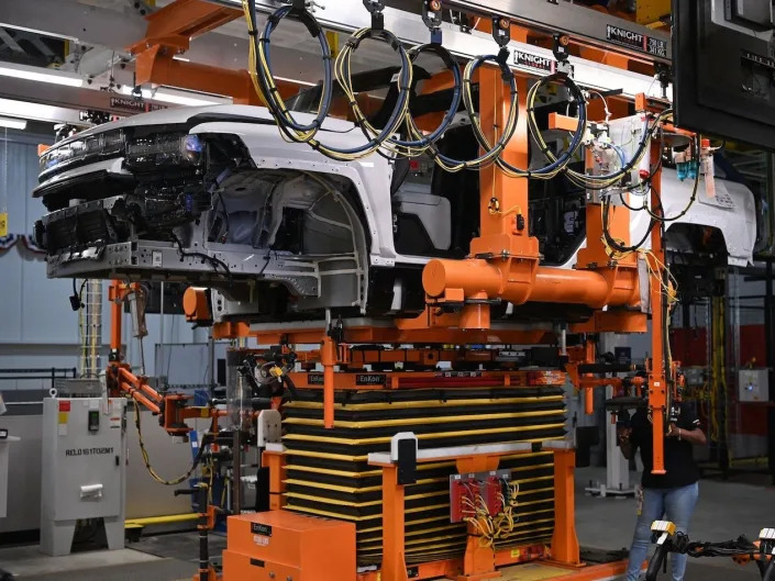 A battery is installed in an electric Hummer at General Motors Factory ZERO electric vehicle assembly plant in Detroit
