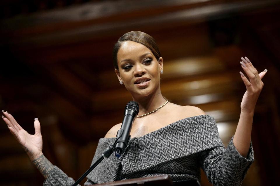 Singer Rihanna addresses an audience after being presented with the 2017 Harvard University Humanitarian of the Year Award during ceremonies, Tuesday, Feb. 28, 2017, at the Sanders Theatre on the school's campus, in Cambridge, Mass. (AP Photo/Steven Senne)