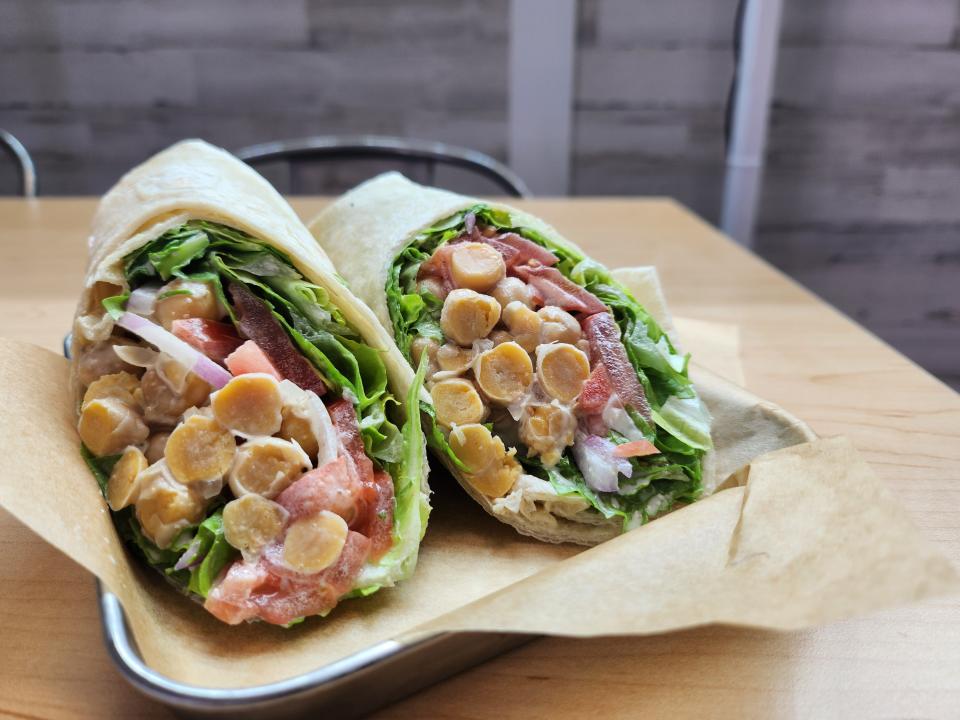 A chickpea wrap with housemade Caesar dressing, lettuce, tomato and red onion at Gray Leaf Cafe in Freehold Township.