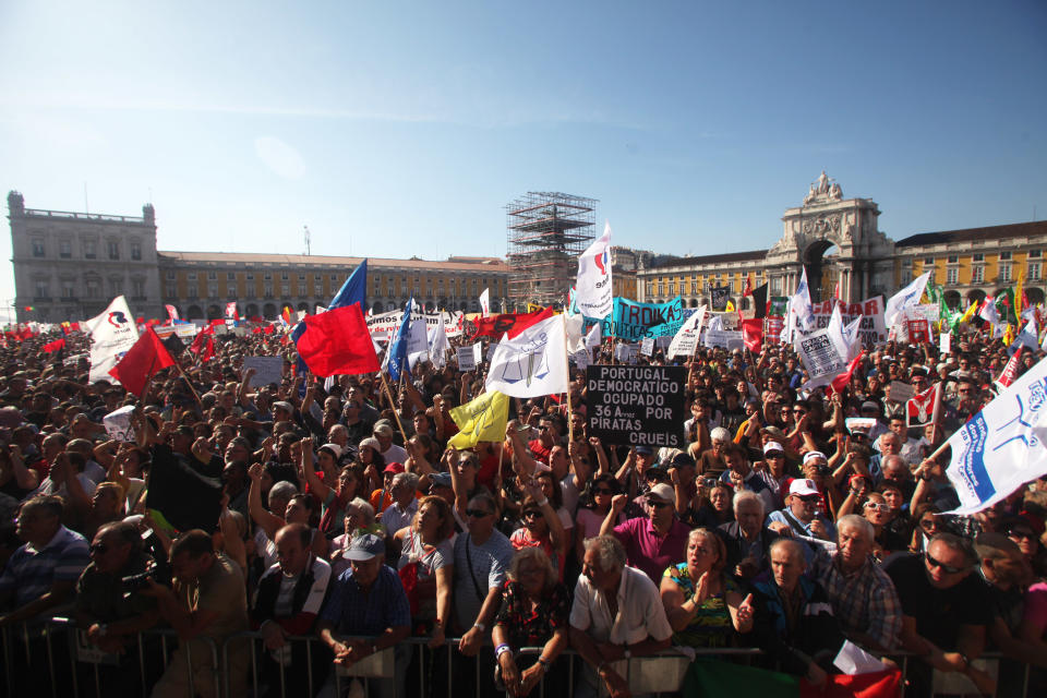 Protestors fill Lisbon's Comercio Square during a workers unions' demonstration, Saturday, Sept. 29 2012. Thousands of Portuguese enduring deep economic pain from austerity cuts took to the streets Saturday in protest. (AP Photo/Joao Henriques)