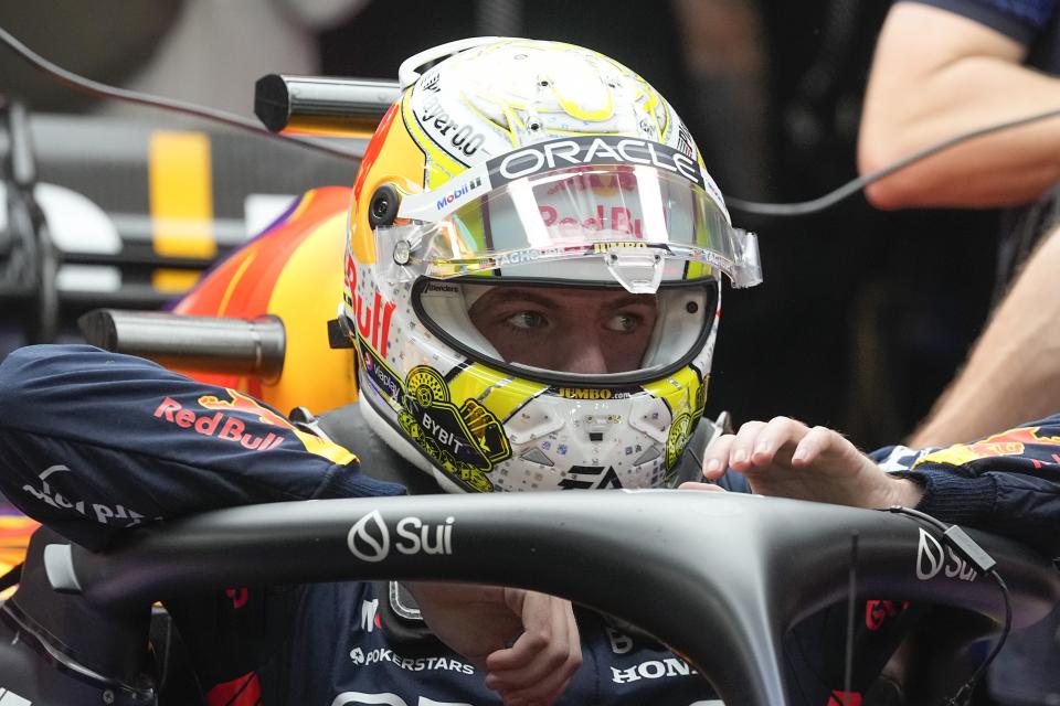 Red Bull driver Max Verstappen, of the Netherlands, climbs into his car during the final practice session for the Formula One Las Vegas Grand Prix auto race, Friday, Nov. 17, 2023, in Las Vegas. (AP Photo/Darron Cummings)