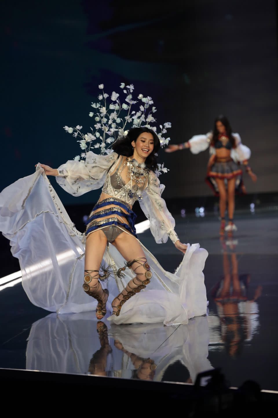 Model Ming Xi fell during the filming of the Victoria's Secret fashion show. Photo: Getty