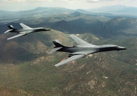 A pair of B-1B Lancer bombers soar over Wyoming in an undated file photo. Staff Sgt. Steve Thurow/U.S. Air Force/Handout via REUTERS