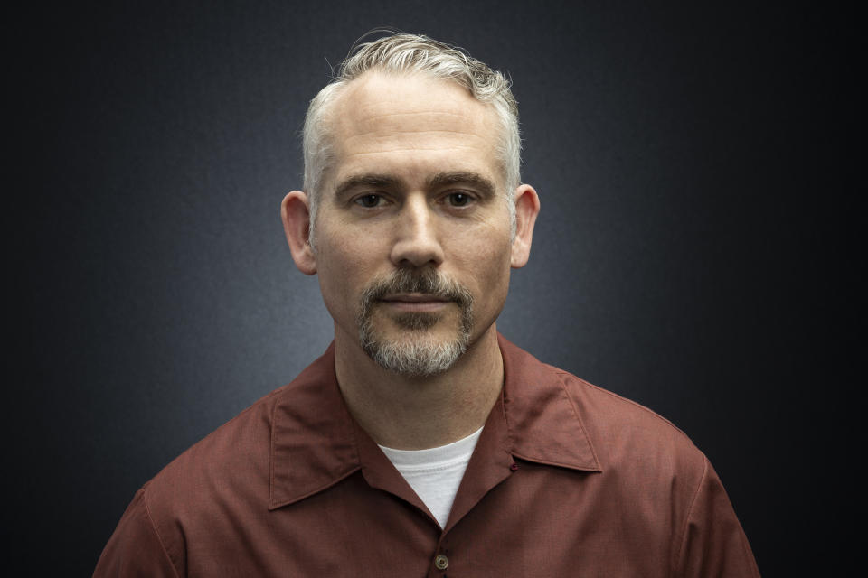 In this March 16, 2020 photo, TV editor and filmmaker Pi Ware poses for a portrait in Los Angeles. Unlike many of his colleagues, Ware is still working. Keeping specifics close to the vest, Ware said he continues to do editing, only now working from his home instead of a studio. (Photo by Willy Sanjuan/Invision/AP)