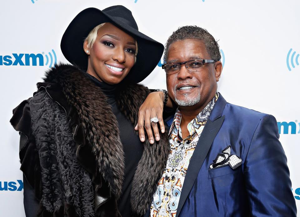 NeNe Leakes and husband Gregg Leakes visit the SiriusXM Studios on December 12, 2014 in New York City