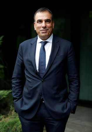 FILE PHOTO: Telecom Italia CEO Amos Genish poses for a photo at the end of a debate at the RAI state television headquarters in Rome, Italy November 10, 2017. REUTERS/Remo Casilli/File Photo