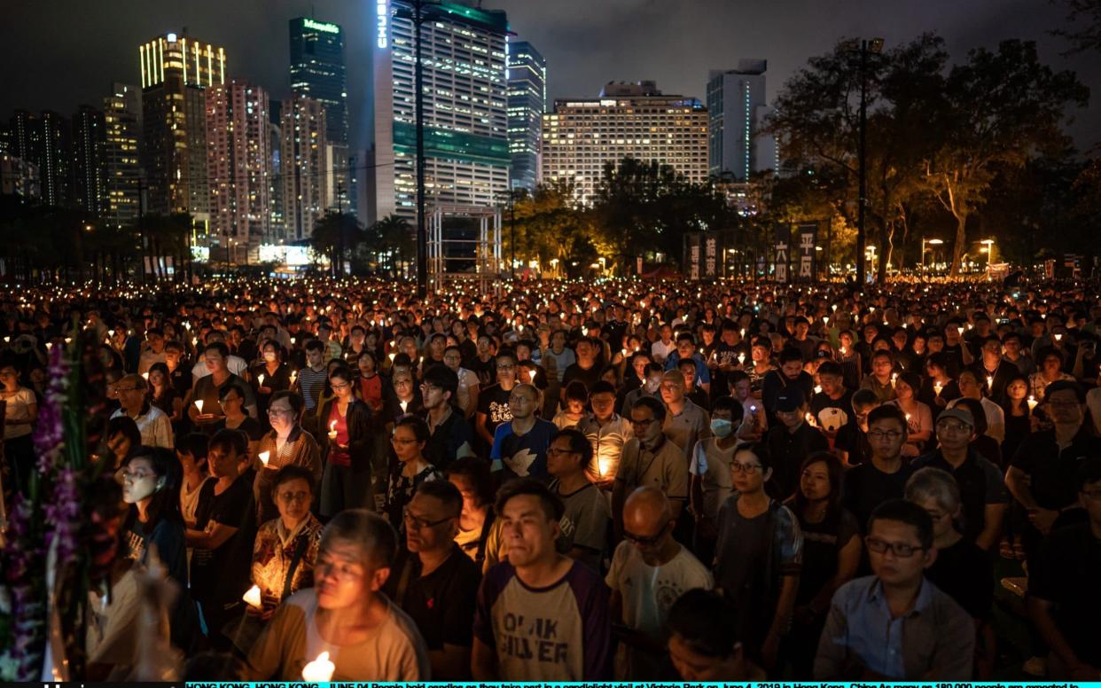 Tens of thousands assembled in Hong Kong for a candlelight vigil on June 4, 2019,, to remember those who died on the 30th anniversary of the Tiananmen Square massacre when the Chinese military gunned down peaceful students and workers calling for reform.  - Getty Images AsiaPac
