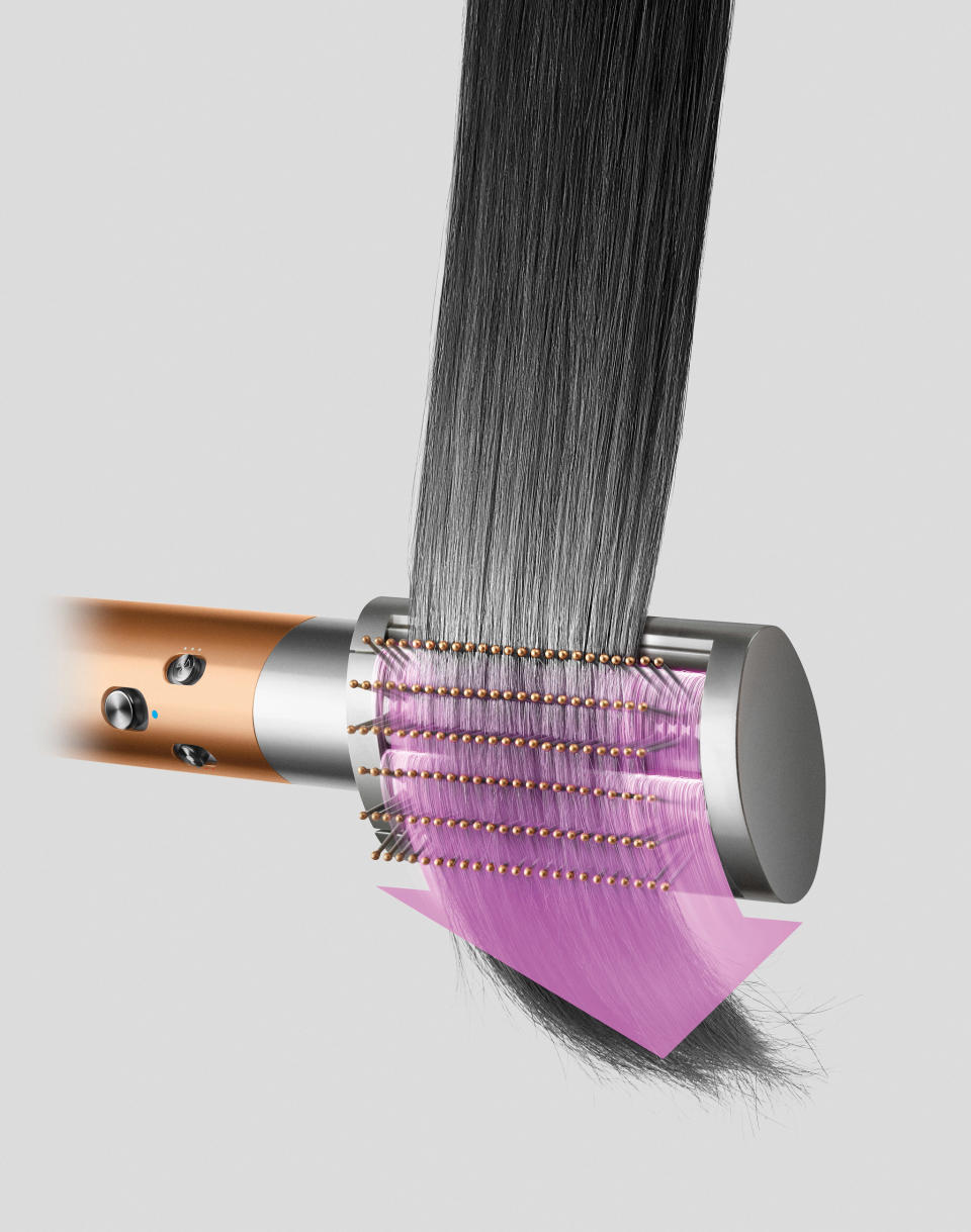 <p>An illustration showing the Dyson Airwrap multi-styler 2022 with a brush attachment with a bunch of hair through it.</p>
