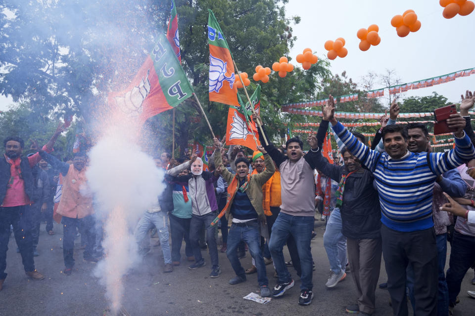 Supporters of India's ruling Bharatiya Janata Party, or BJP, celebrate early leads for the party in Rajasthan state elections in Jaipur, India, Sunday, Dec.3, 2023. India’s Hindu nationalist party was headed for a clear win in three out of four states Sunday, according to the election commission’s website. (AP Photo/Deepak Sharma)