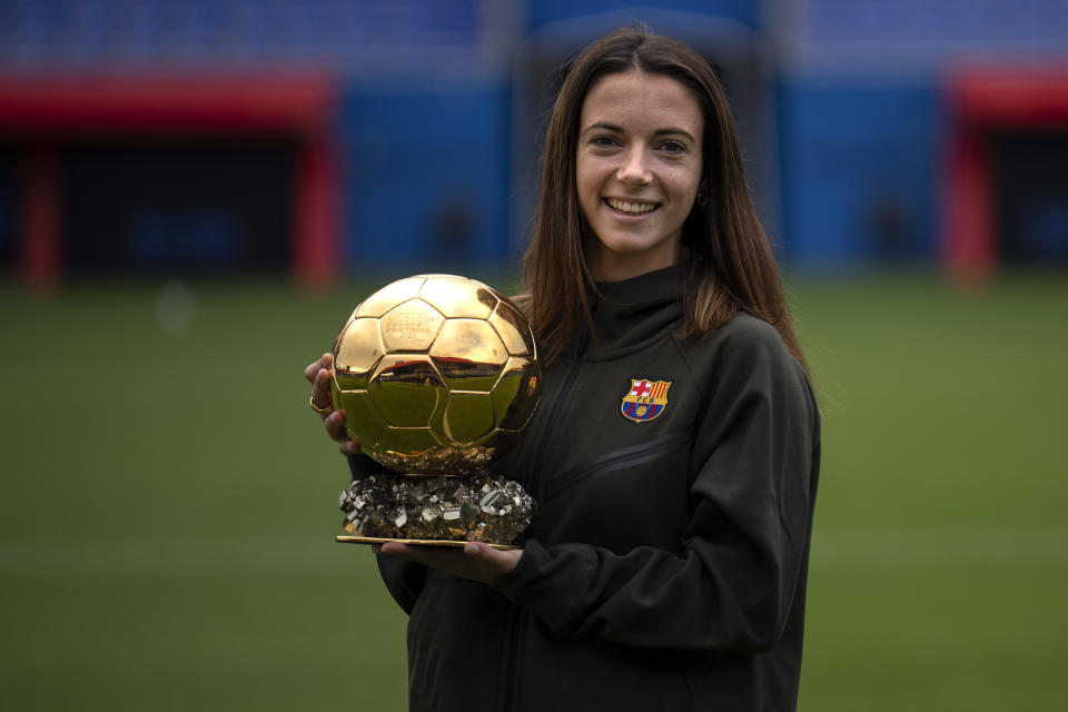 FC Barcelona and Spain's national team midfielder Aitana Bonmati holds the 2023 Women's Ballon d'Or trophy, during a press conference in Barcelona, Spain, Thursday, Nov. 2, 2023. (AP Photo/Emilio Morenatti)