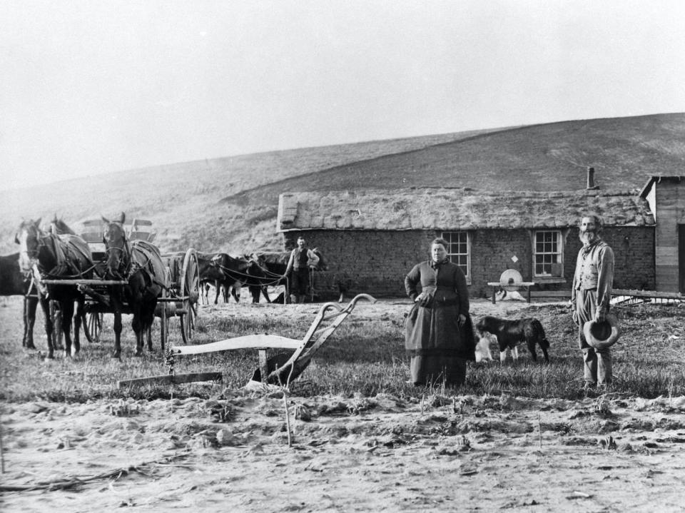 Settlers, like the family shown here in Custer County, Nebraska, left the East to pioneer in frontier country.