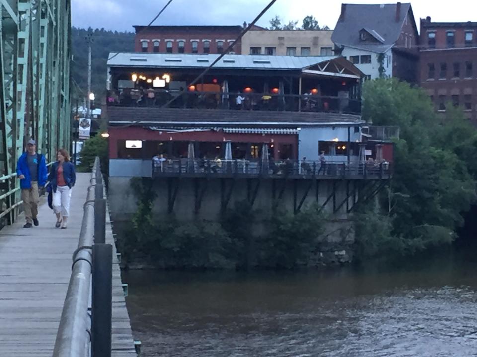 A view from the New Hampshire side of the Connecticut River of the Whetstone Station Restaurant & Brewery in Brattleboro on Aug. 1, 2021.