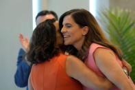 Former state Rep. Katie Arrington, left, hugs U.S. Rep. Nancy Mace, right, after giving her public support for her campaign on Thursday, June 16, 2022, in Charleston, S.C. Mace defeated the Trump-backed Arrington in South Carolina's 1st District Republican primary on Tuesday. (AP Photo/Meg Kinnard)