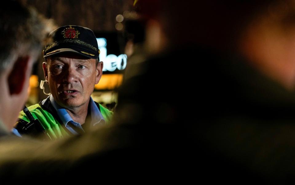 Task leader Tore Barstad speaks at the site of the shooting at the London Pub in central Oslo, Norway - Javad Parsa/NTB/via REUTERS