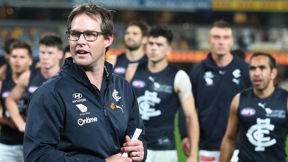 Pictured here, Carlton coach David Teague addresses his Blues players.