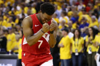 Kyle Lowry #7 of the Toronto Raptors celebrates late in the game against the Golden State Warriors during Game Six of the 2019 NBA Finals at ORACLE Arena on June 13, 2019 in Oakland, California. (Photo by Ezra Shaw/Getty Images)