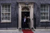 Britain's Prime Minister Rishi Sunak, left, gestures as he welcomes Ukraine's President Volodymyr Zelenskyy at Downing Street in London, Wednesday, Feb. 8, 2023. It is the first visit to the UK by the Ukraine President since the war began nearly a year ago. (AP Photo/Alberto Pezzali)