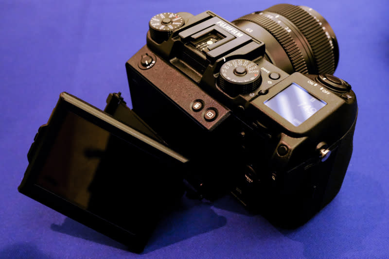 You can tilt the rear LCD 3 ways, just like the X-T2.