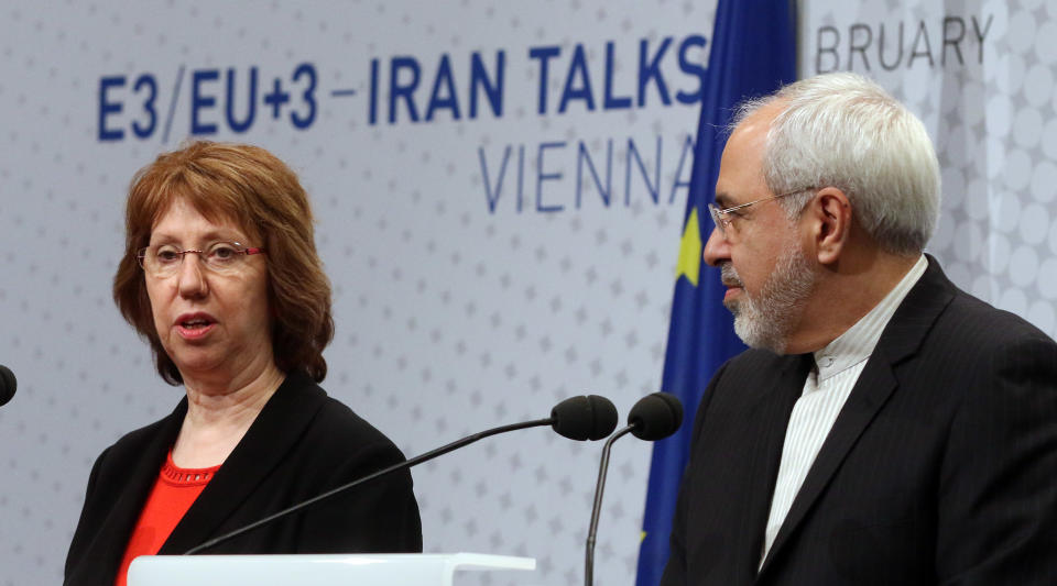 European Union High Representative Catherine Ashton, left, and Iranian Foreign Minister Mohammad Javad Zarif, speak to the press after closed-door nuclear talks in Vienna, Austria, Thursday, Feb. 20, 2014. Iran and six world powers are back at the negotiating table eager to come to terms on a comprehensive nuclear deal but deeply divided on what it should look like. The two sides began meeting Tuesday in attempts to build on a first-step accord that temporarily curbs Tehran's nuclear activities in exchange for some sanctions relief. (AP Photo/Ronald Zak)