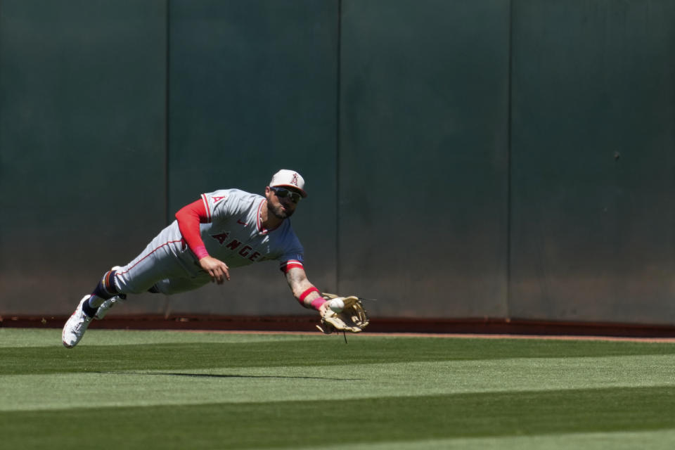 Los Angeles Angels center fielder Kevin Pillar catches a fly ball hit by Oakland Athletics' JJ Bleday during the fourth inning of a baseball game Thursday, July 4, 2024, in Oakland, Calif. (AP Photo/Godofredo A. Vásquez)