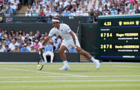 Tennis - Wimbledon - All England Lawn Tennis and Croquet Club, London, Britain - July 11, 2018. Switzerland's Roger Federer in action during his quarter final match against South Africa's Kevin Anderson. REUTERS/Andrew Boyers