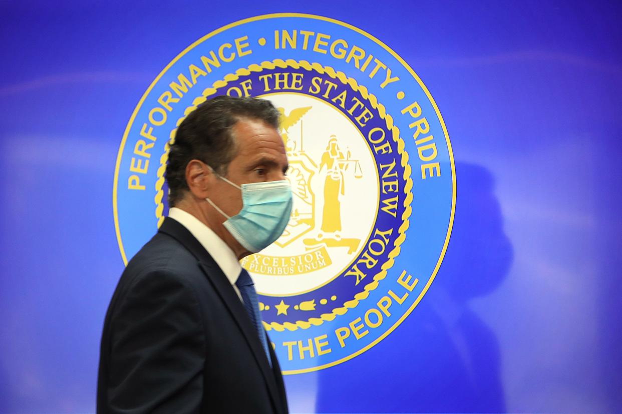 New York Governor Andrew Cuomo arrives wearing a mask to his daily briefing on the state's coronavirus reopening process on May 29, 2020 at Iona College in New Rochelle.