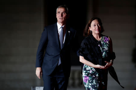 Secretary General of North Atlantic Treaty Organization (NATO) Jens Stoltenberg and his wife Ingrid Schulerud arrive to attend a visit and a dinner at the Orsay Museum on the eve of the commemoration ceremony for Armistice Day, 100 years after the end of the First World War, in Paris, France, November 10, 2018. REUTERS/Benoit Tessier