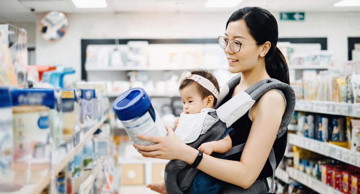 A mother shopping for baby formula