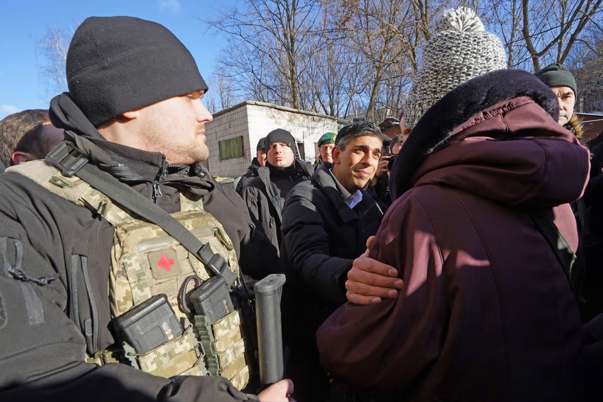 Rishi Sunak talks to members of the public in Kyiv (PA)