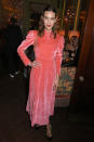 <p>London Fashion Week Queen, Alexa Chung, donned a crushed velvet midi for the Vogue party. <em>[Photo: Getty]</em> </p>